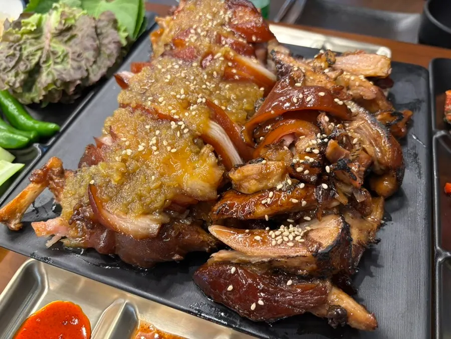 Honey garlic jokbal topped generously with garlic sauce