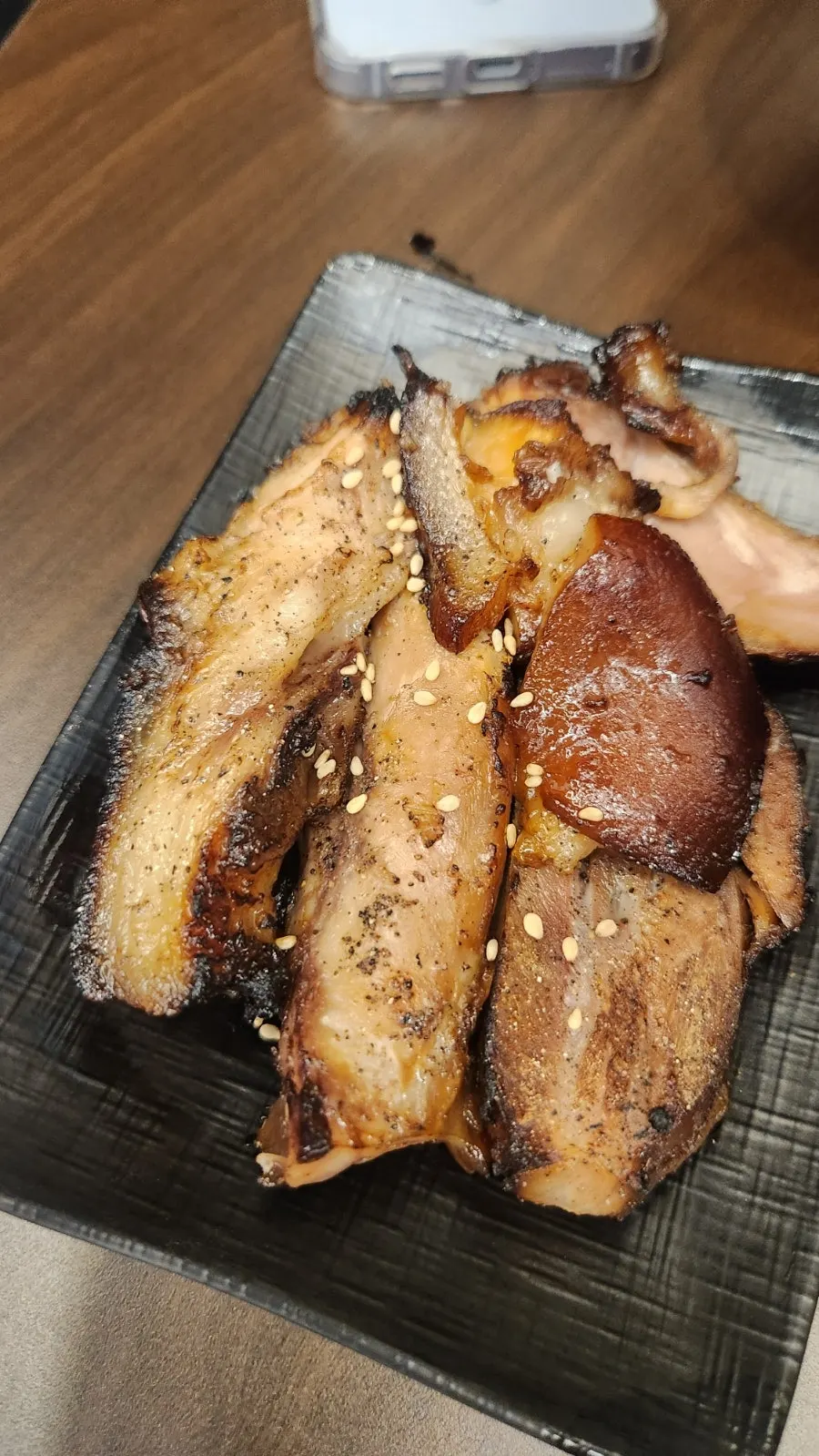 Salt-grilled jokbal barbecue given as a service