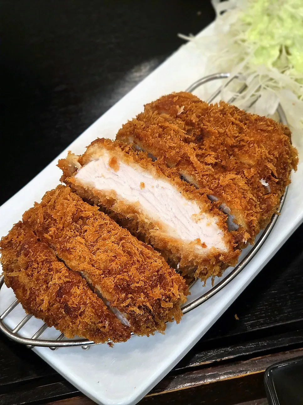 Cross-section of Cheongdam Kkatsu's low-grease pork cutlet