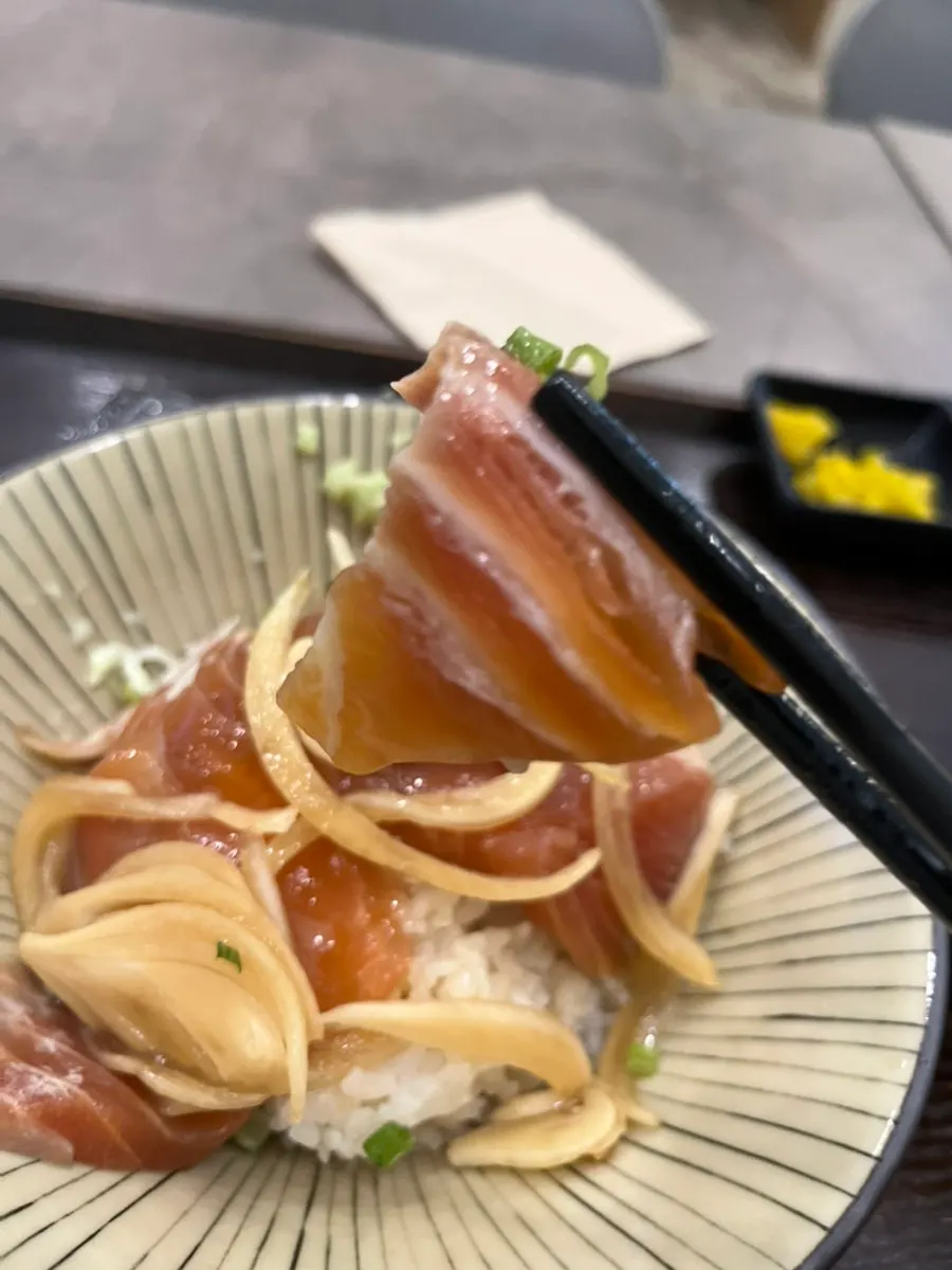 A spoonful of the salmon jang rice bowl