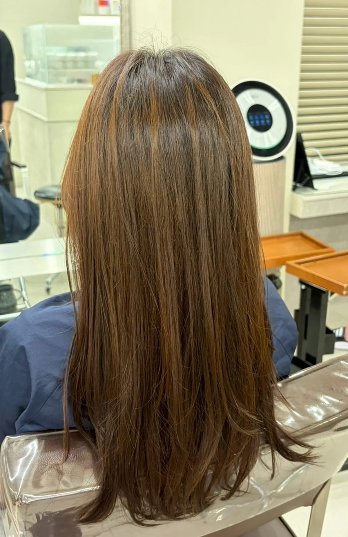 Long hair after the finished cut, clinic, and styling