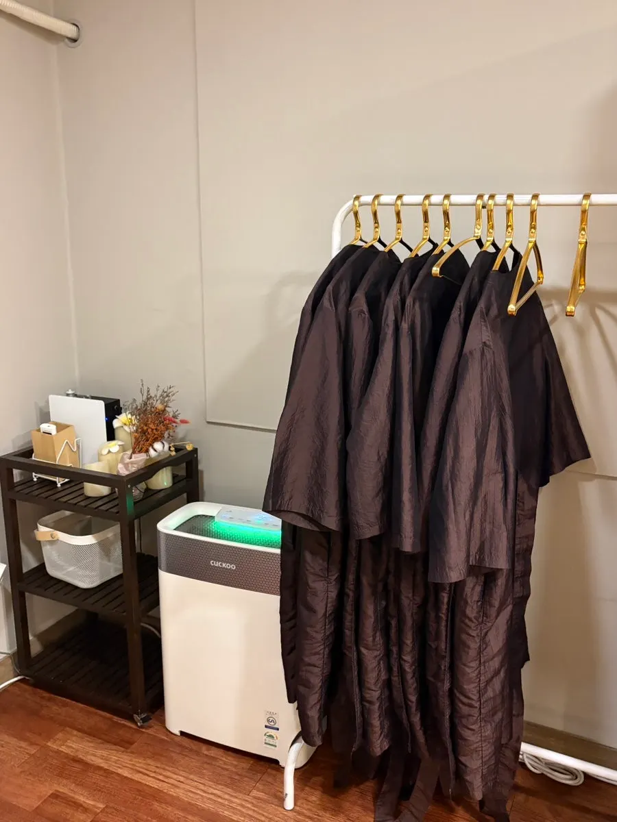 Gowns and lockers in Clermont Monde's changing room