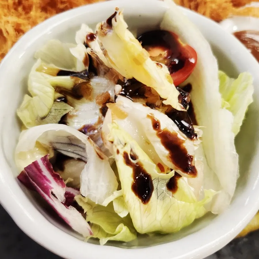 Balsamic lettuce salad served with bogkatsu