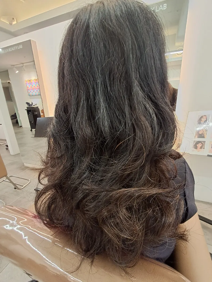 Back of the head showing frizzy hair condition