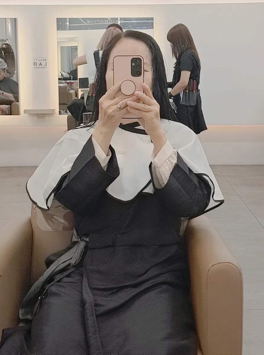 Damaged hair ends with lingering old dye color