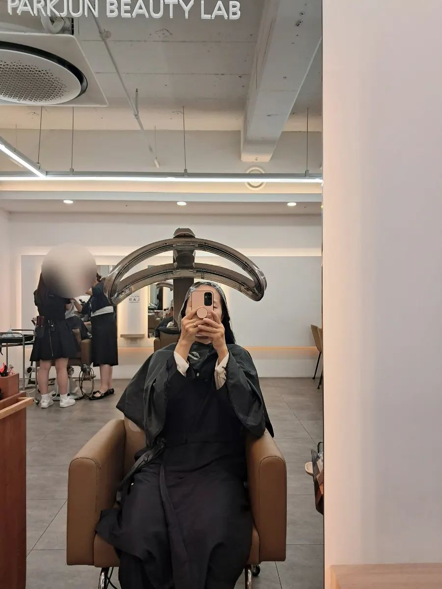 Checking hair condition before the perm