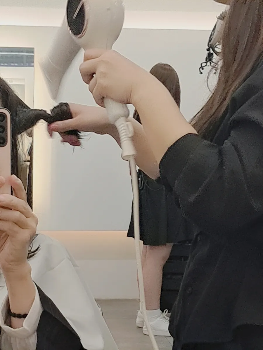 Long hair with natural volume after the perm