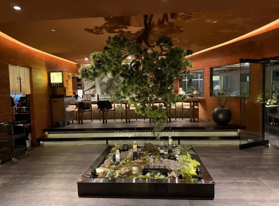Osa Cheongdam entrance with lighting and plants