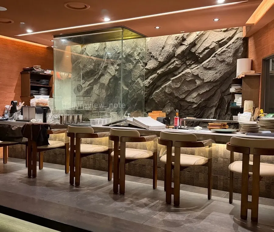 Dining hall and bar seating at Osa Cheongdam