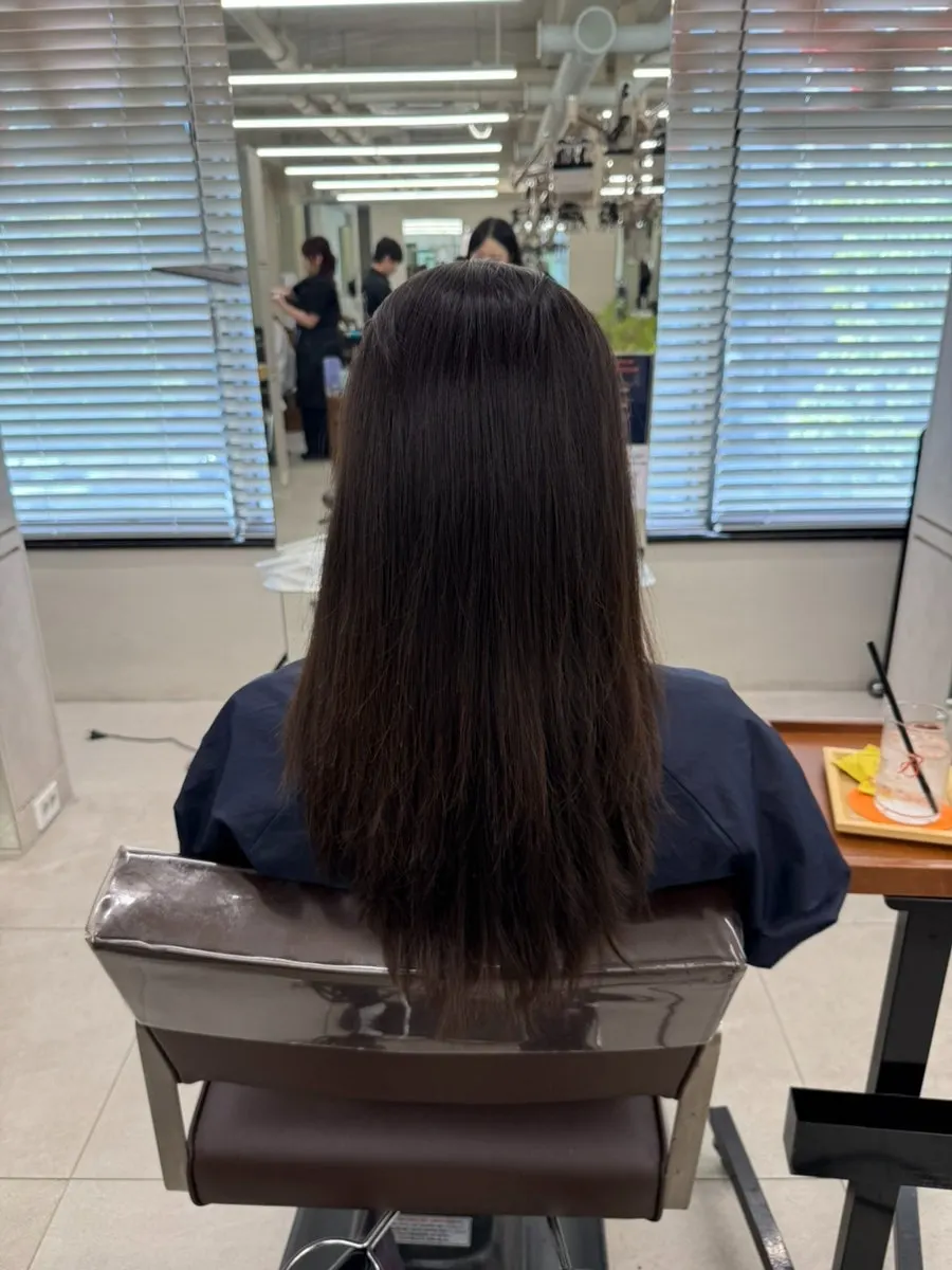 Neatly styled mid-length hair