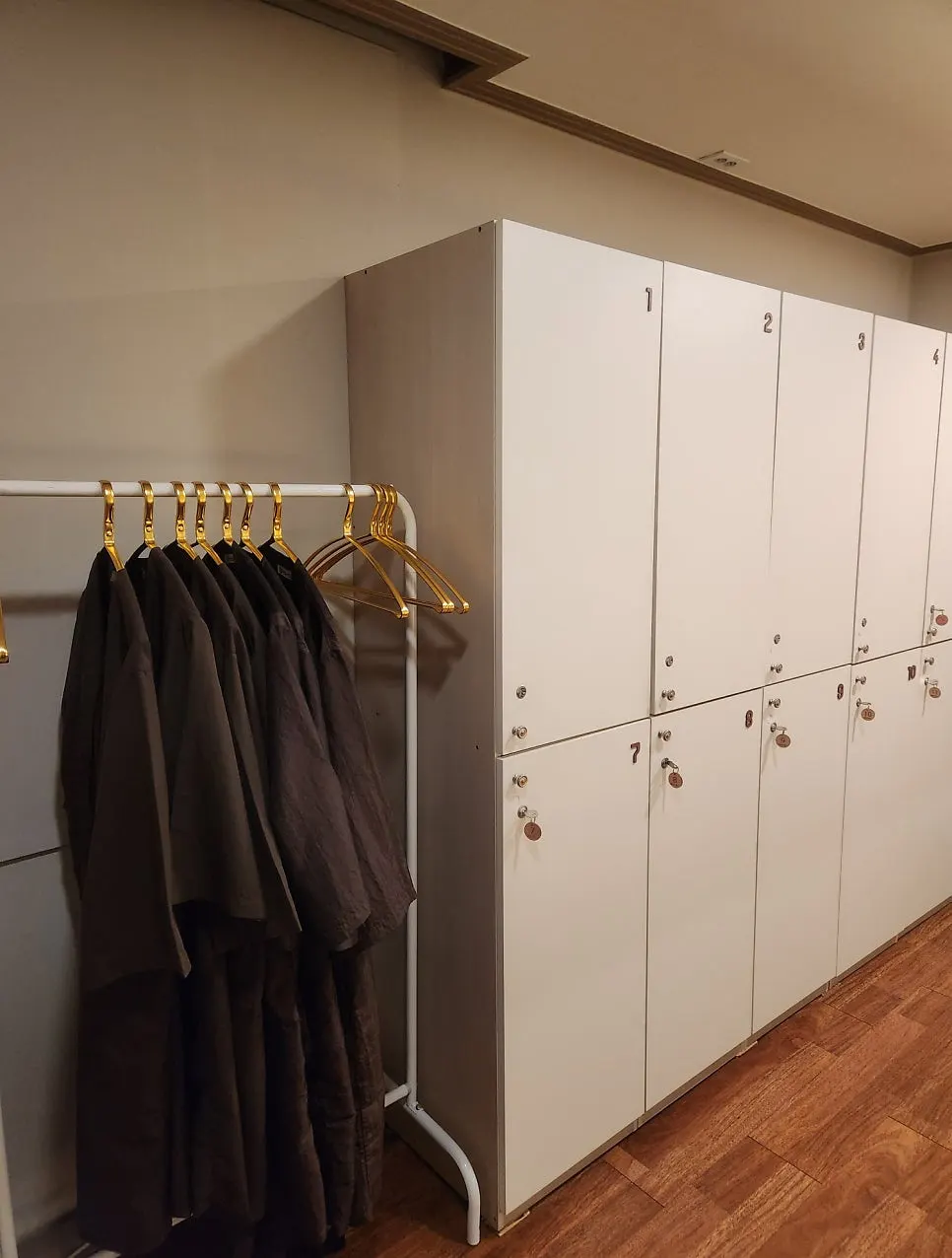 Changing room with robes and lockers