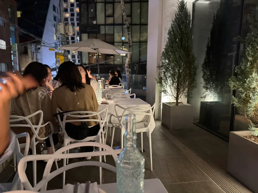 Outdoor terrace seats on an autumn night
