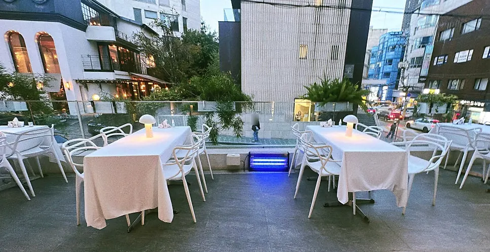 People the Terrace interior with evening lights on