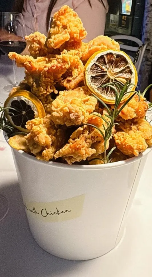Chicken bucket served with potato chips