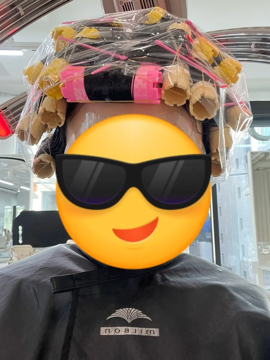 Enjoying a drink during the perm appointment