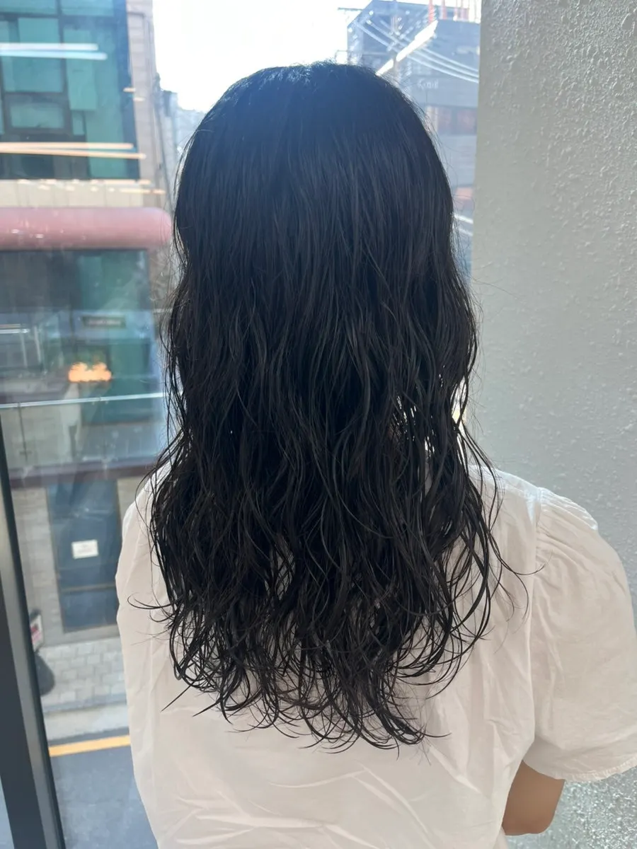Regular perm treatment creating curls from the ends