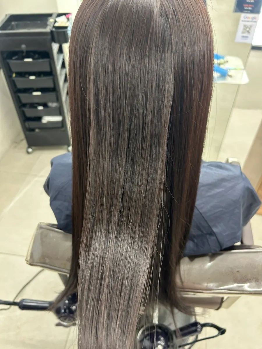 Tidying the hair after cool brown wedding color