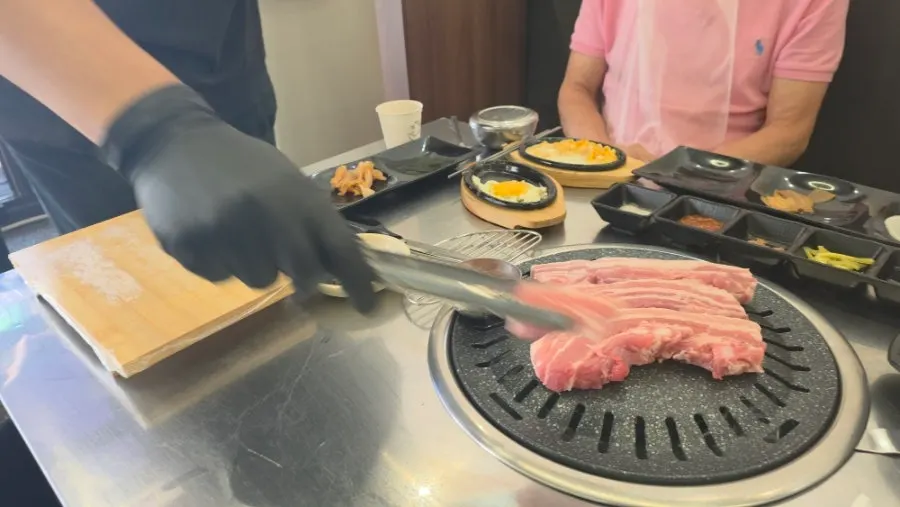 A table set up with a grill plate