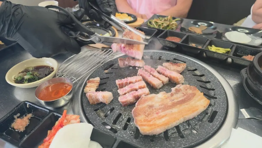 Pork belly grilling on the tabletop grill