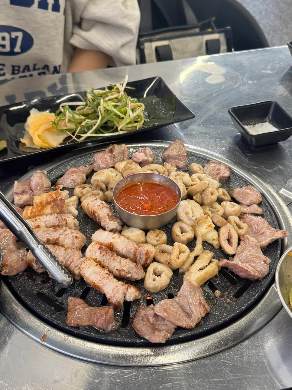 Pork belly, pork jowl, and makchang grilling together
