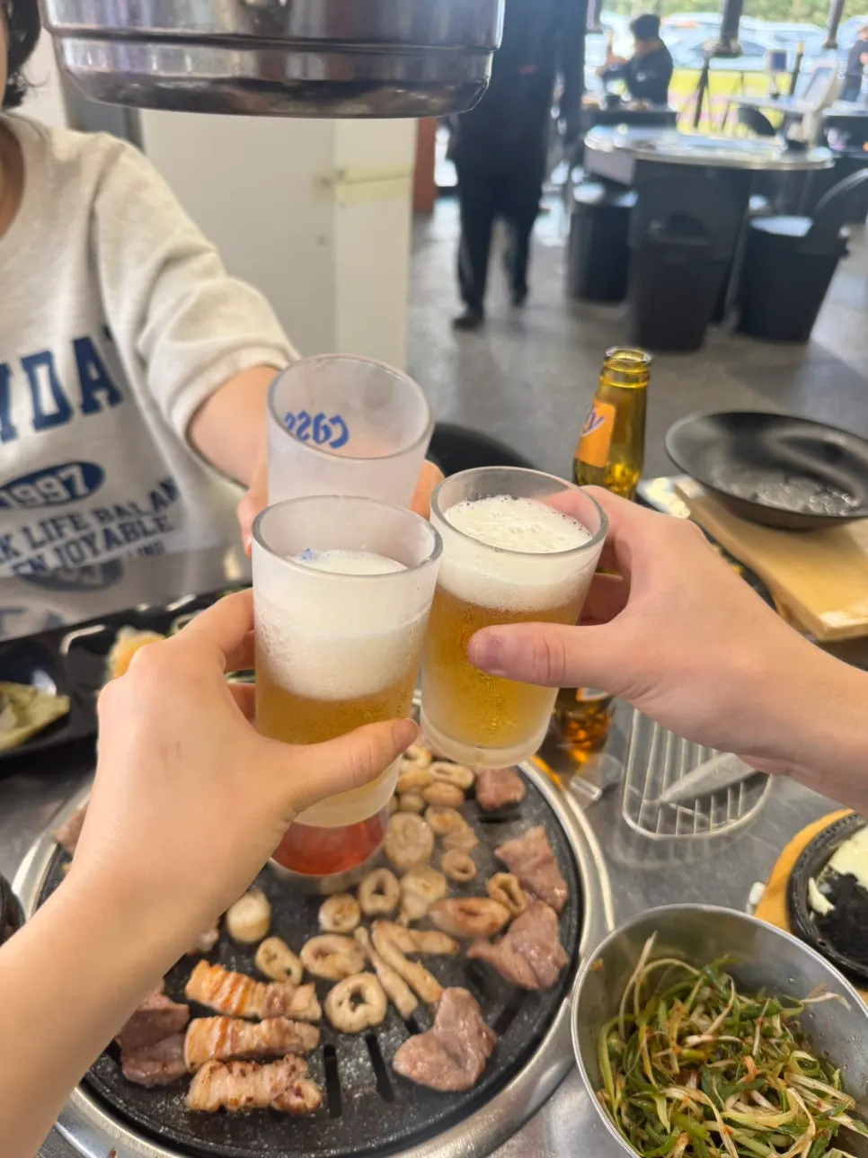 A glass of beer served alongside the meat