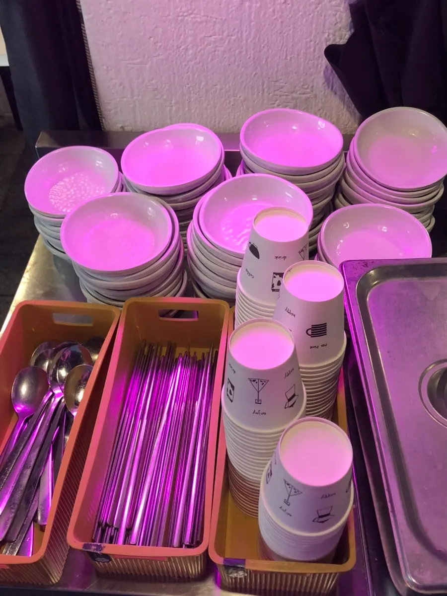 Self-service bar with bowls and utensils