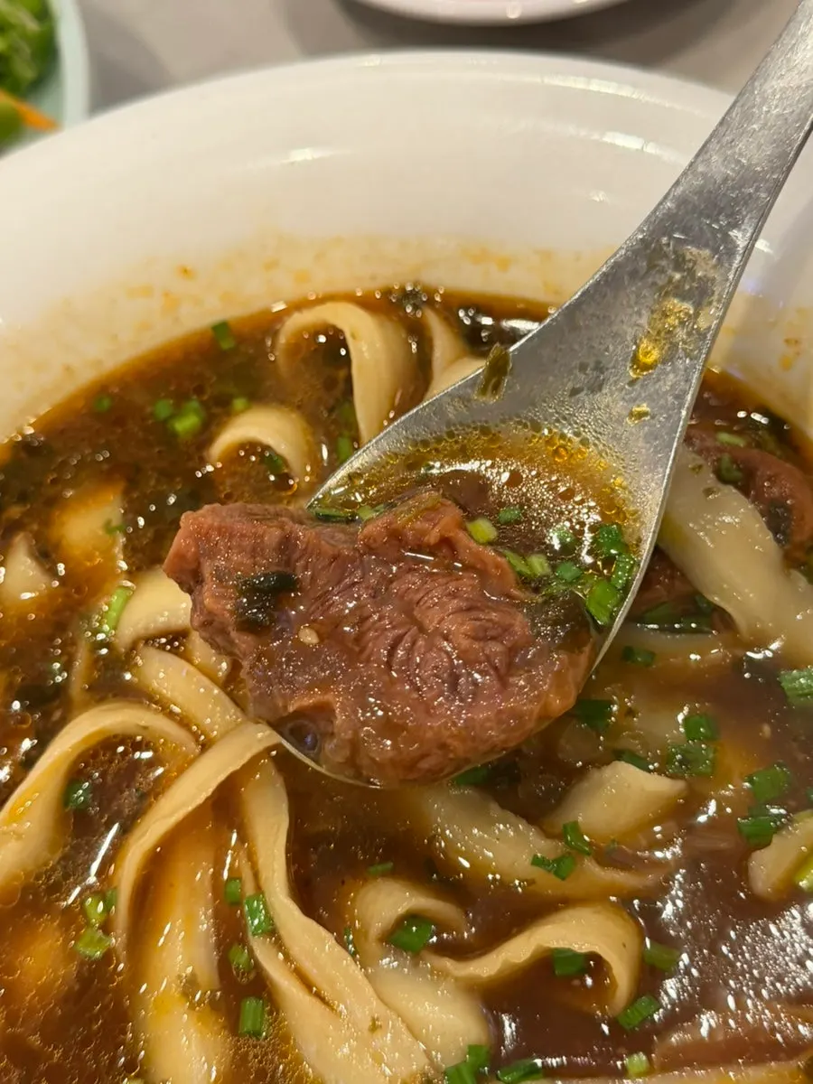 Tender, slow-simmered beef in the noodle soup