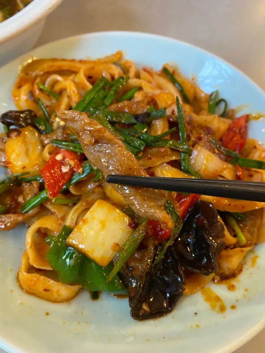 Charred beef inside the stir-fried beef noodles