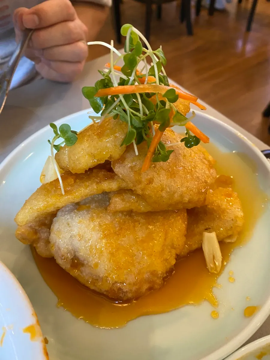 Quabaorou topped generously with sauce