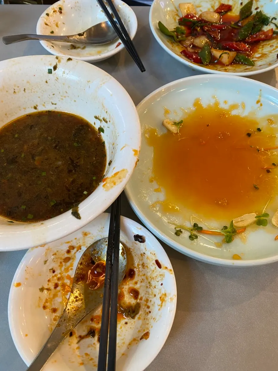 The finished plates of beef noodles and quabaorou