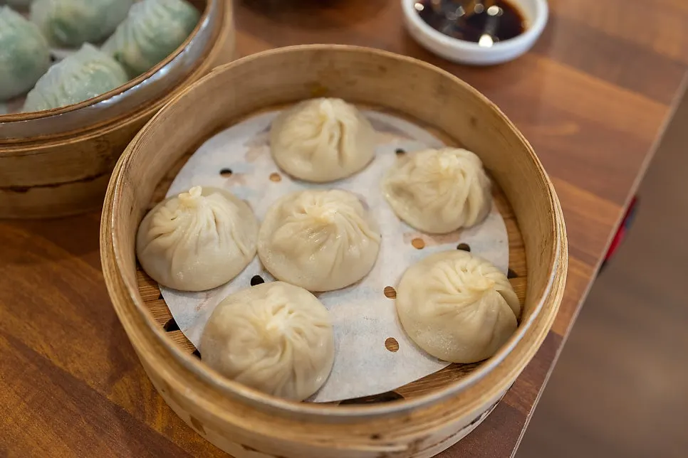 A plate of pork-filled xiaolongbao
