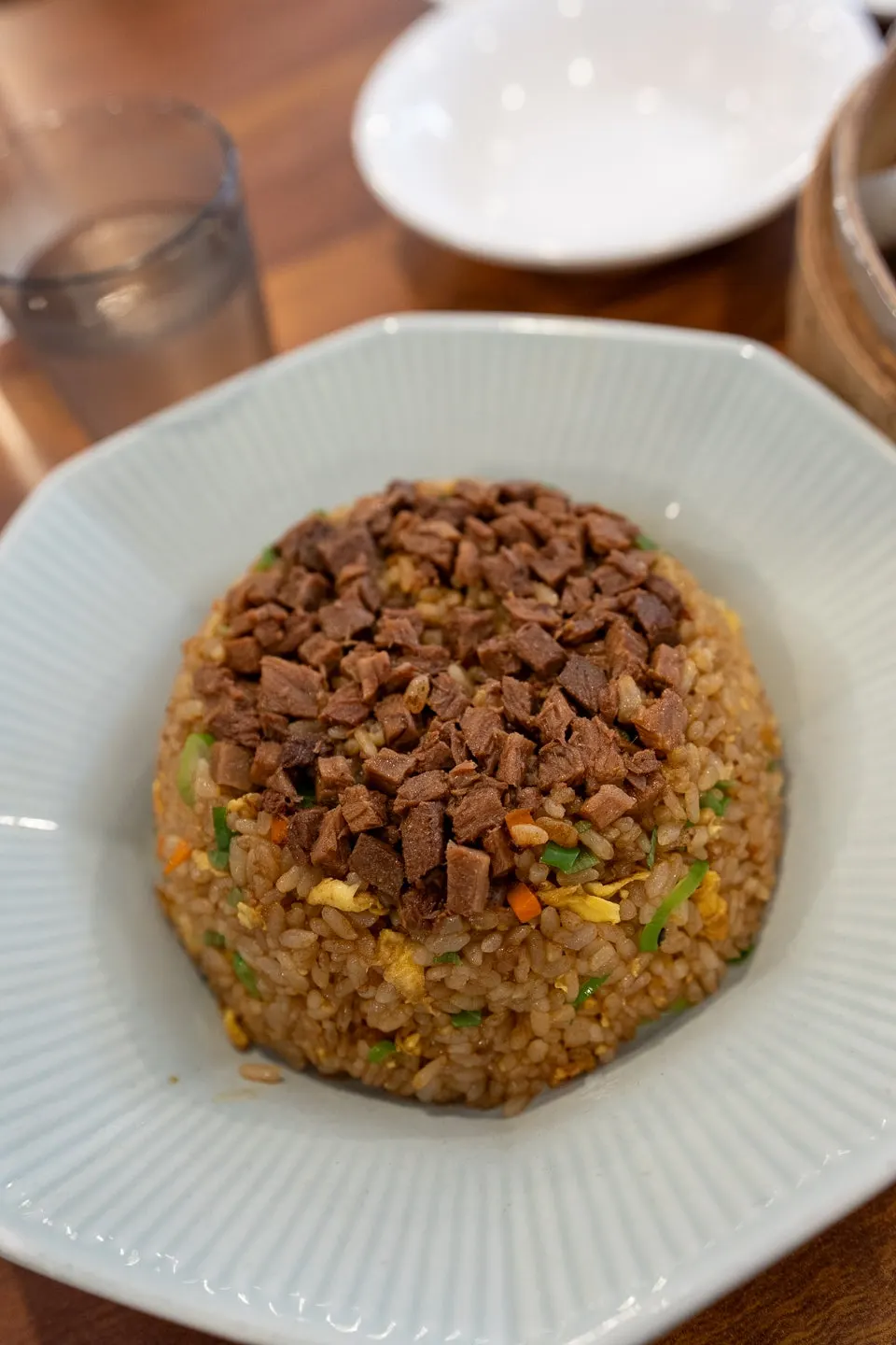 A spoonful of fluffy beef fried rice