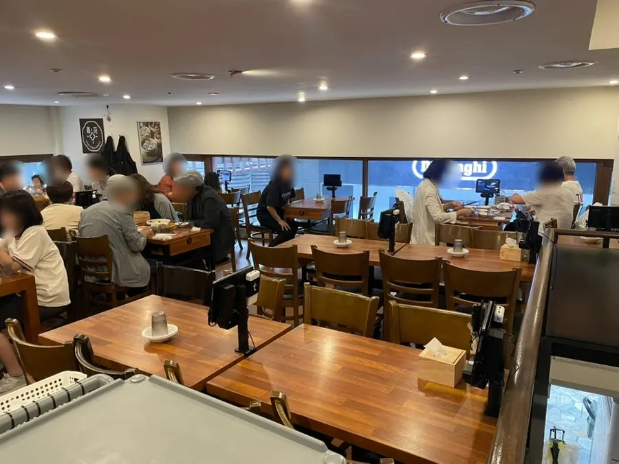 Interior of the 1st floor with customers seated