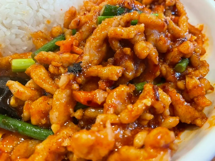 Yuxiang pork bowl with glossy sauce mixed through