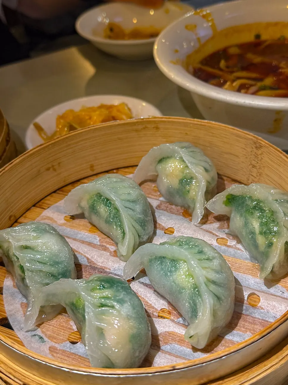 Close-up of a crystal dumpling with its chewy translucent wrapper