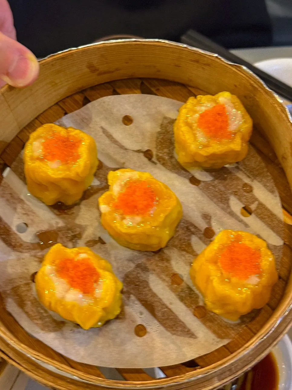Five pieces of shumai filled with pork and shrimp