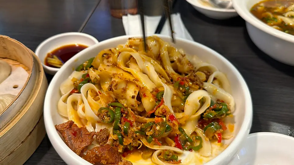 Yubal dosakmyeon mixed noodles topped with scallion oil