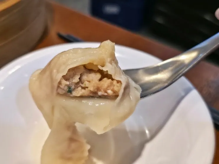 Close-up of the moist xiaolongbao wrapper