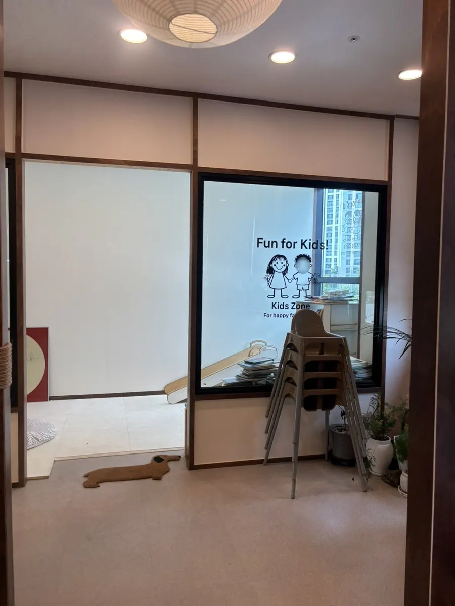 Jeju Badang's kids' zone with books and coloring activities