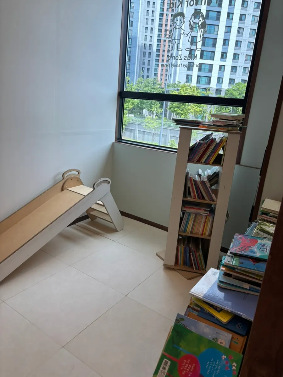 Kids' zone area with a baby chair