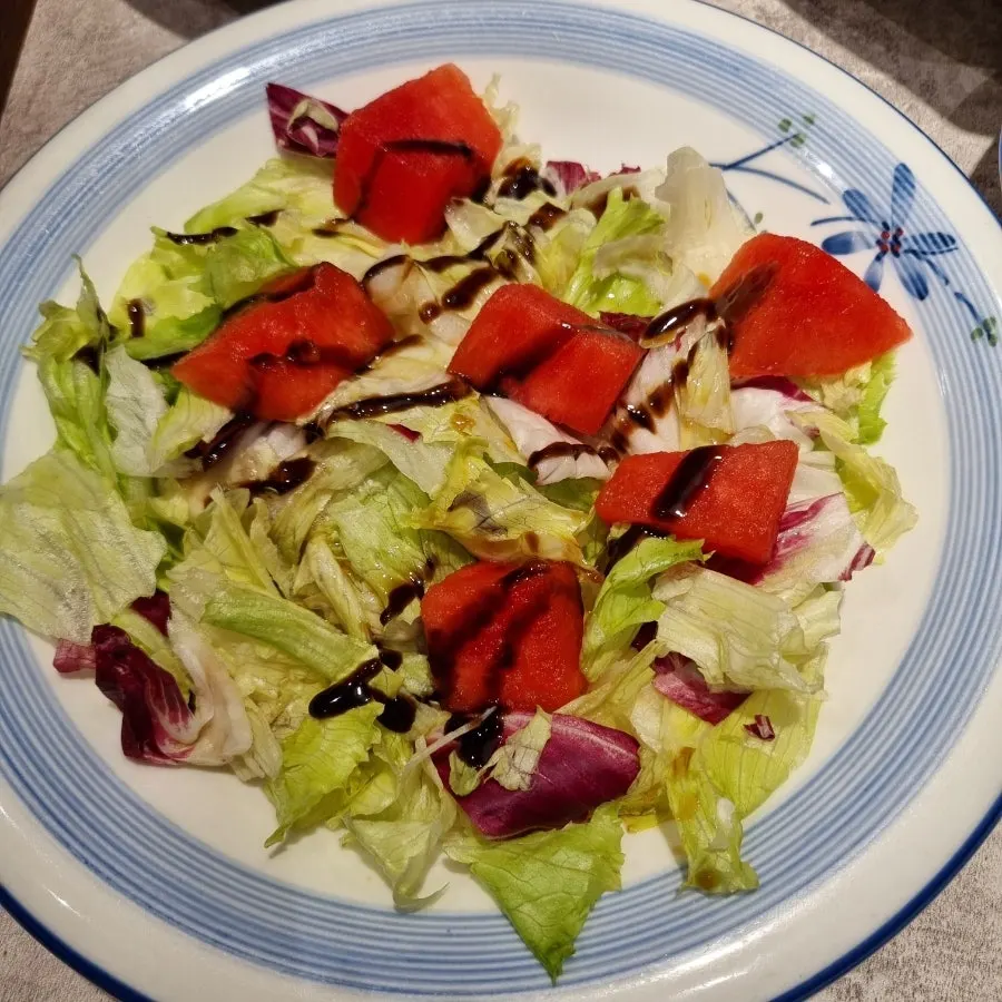 Basic banchan spread and watermelon lettuce salad