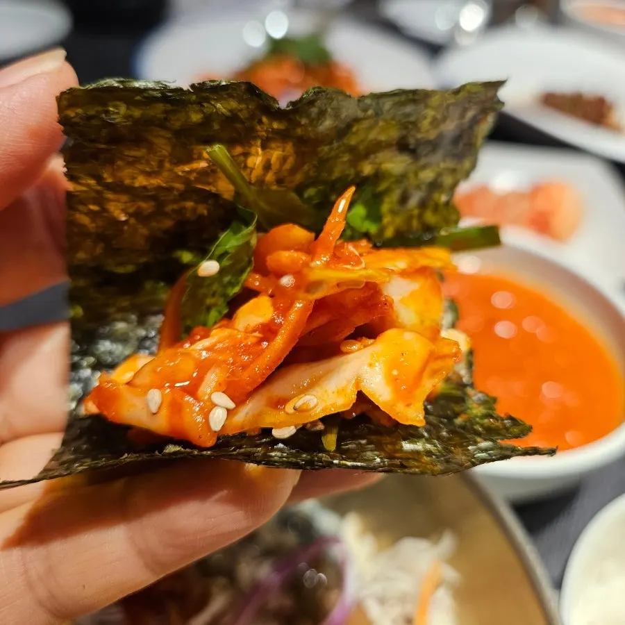 Seasoned pollock sashimi wrapped in gopchang gim