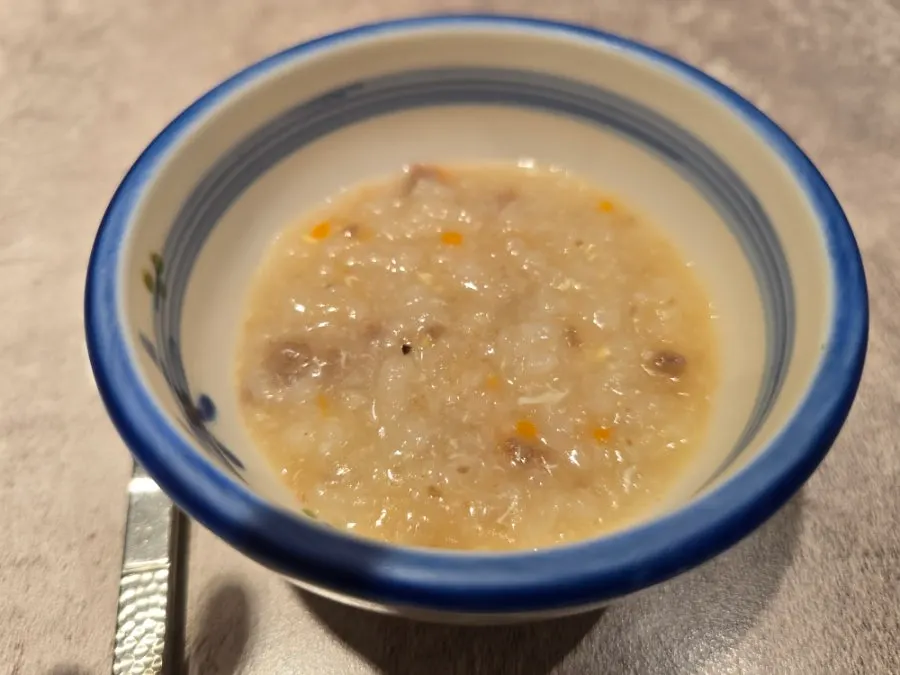 Rice porridge and spoon served as the first course