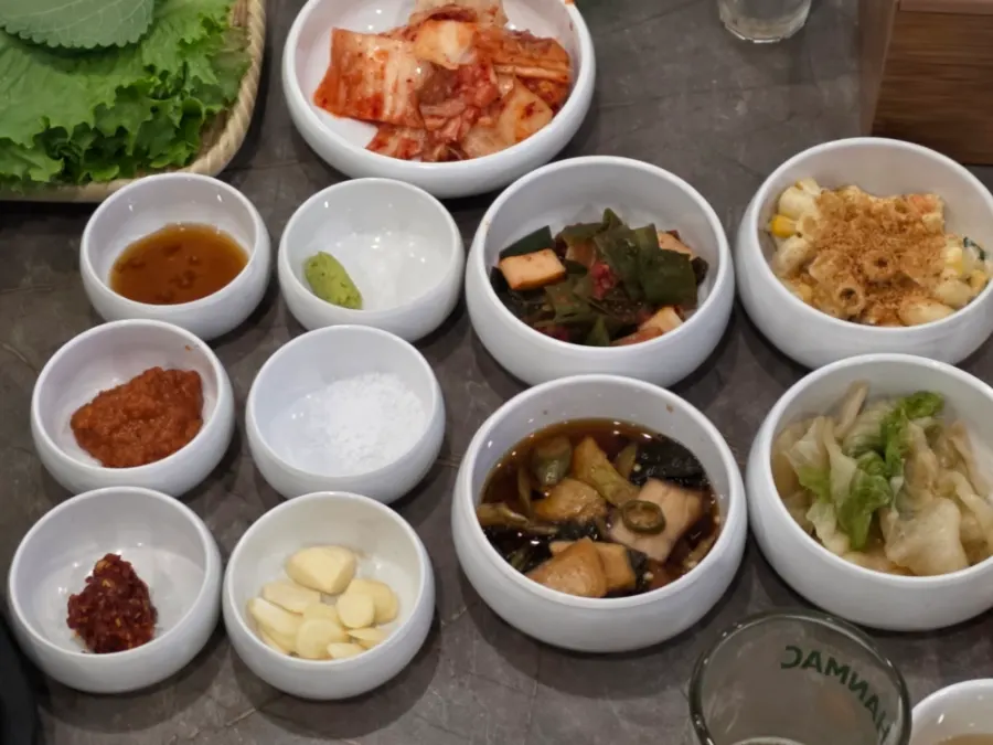 White kimchi, scallion salad, and macaroni salad
