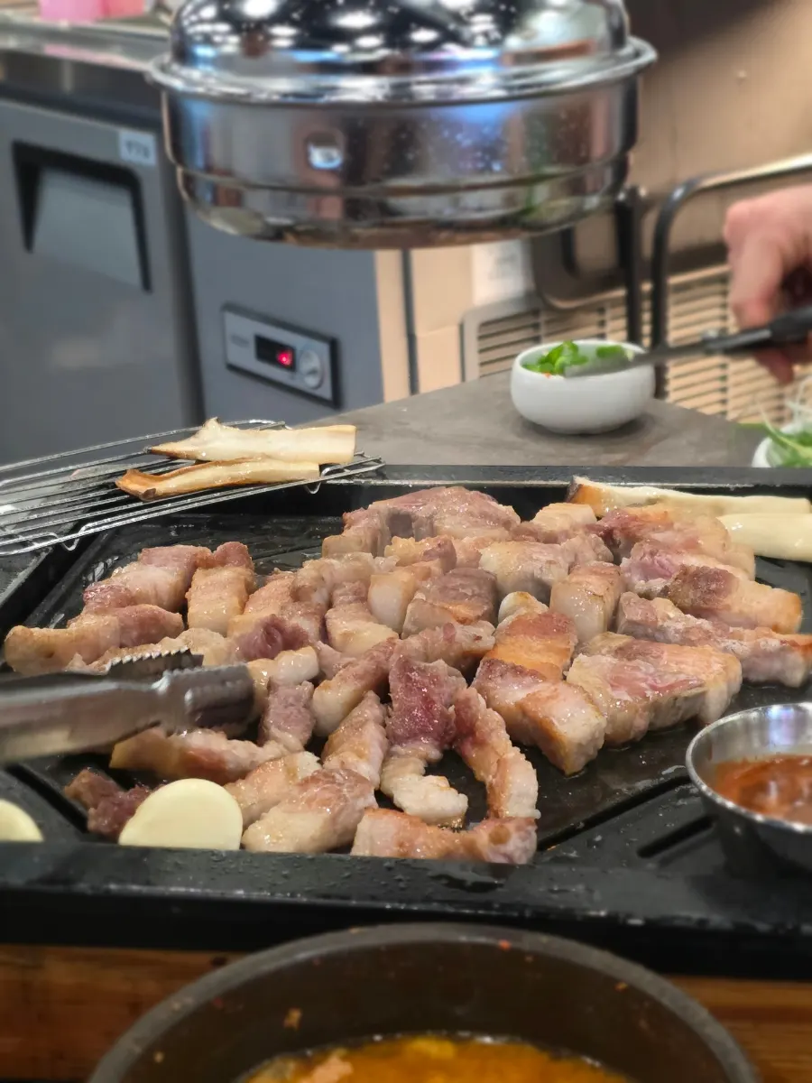 Aged pork belly on the grill