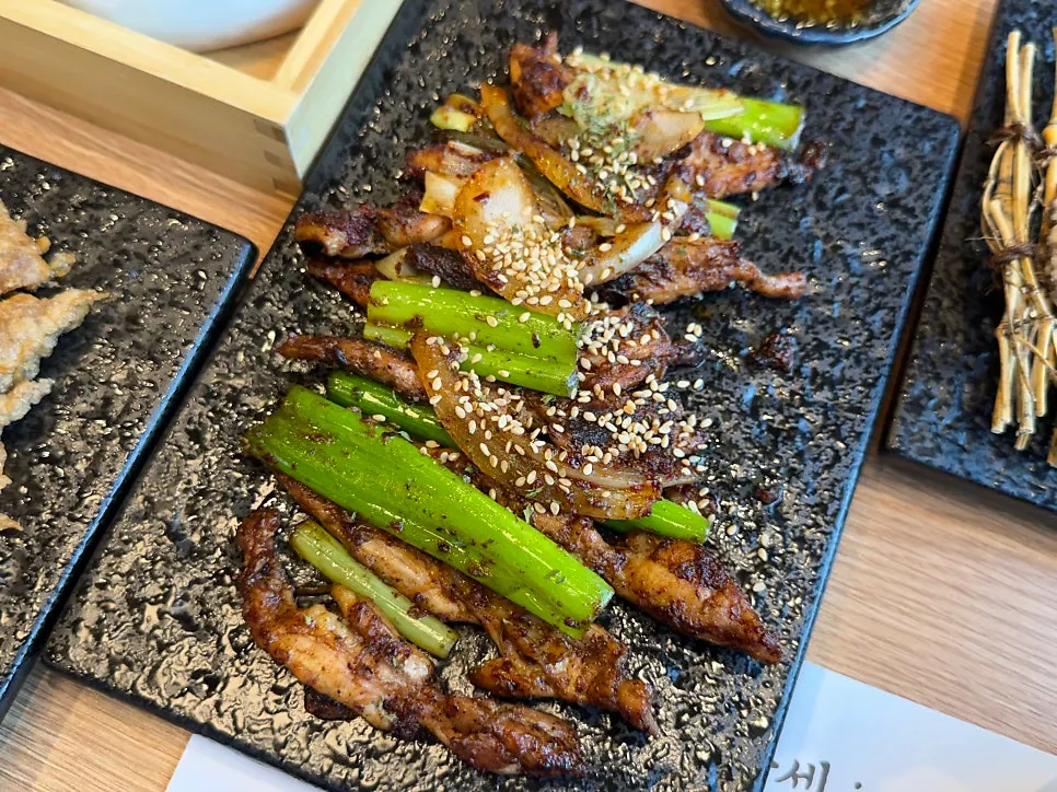 Grilled chicken neck meat with grilled green onion