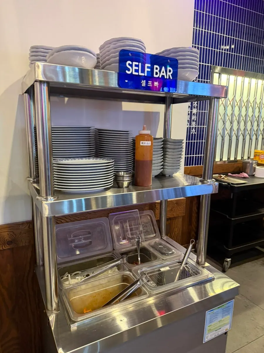 Self-serve bar with refillable side dishes