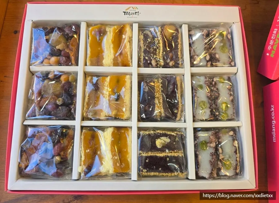 Two boxes of packaged rice cake gift sets