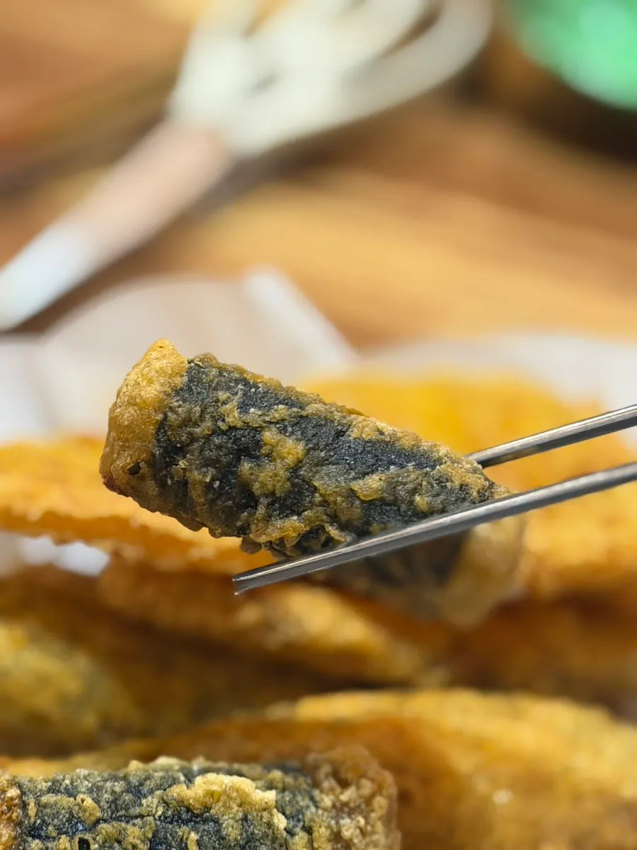 One serving of spicy odeng in bold seasoning