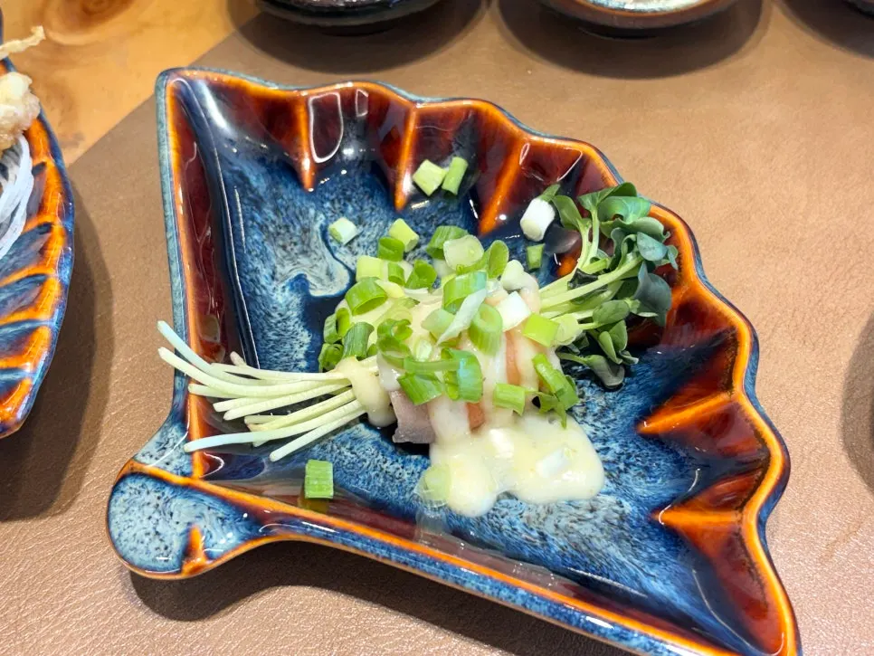 Sashimi and sushi served as part of the course
